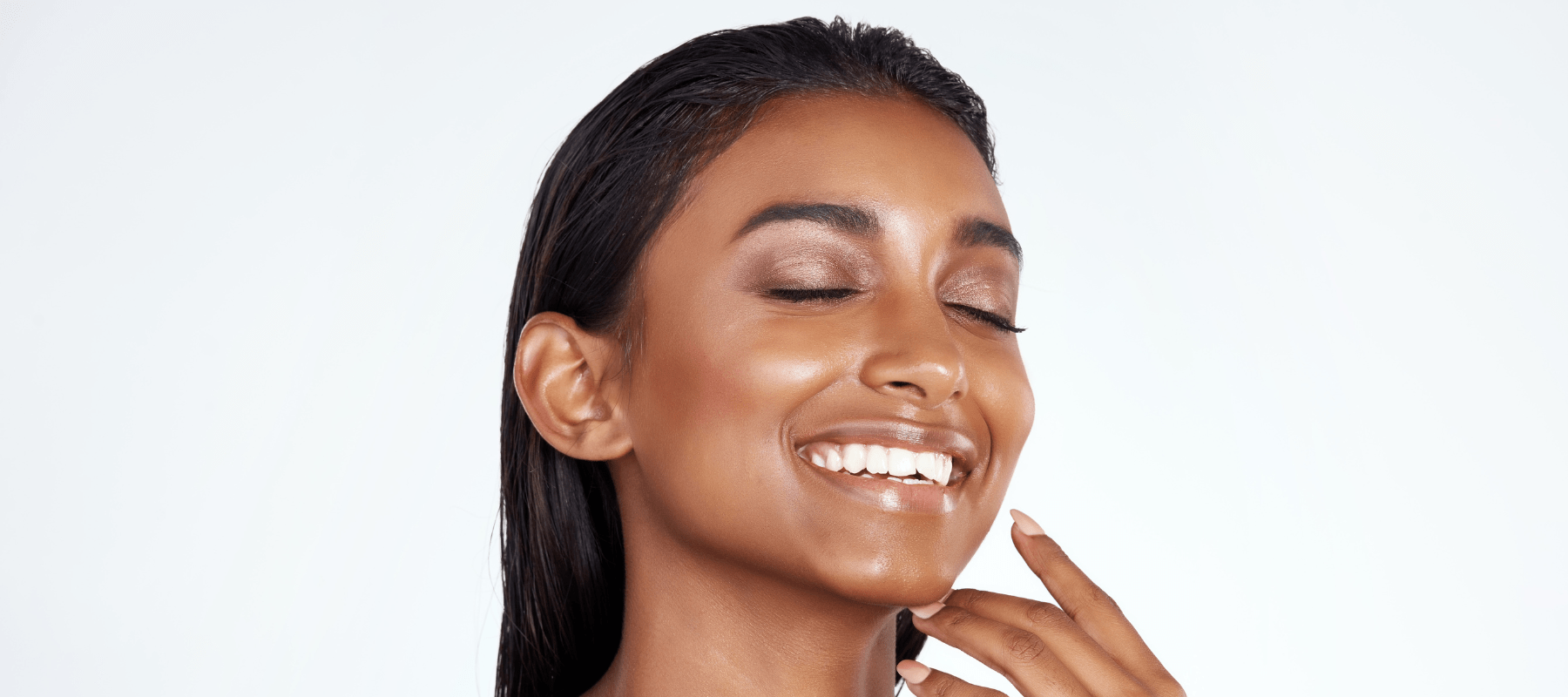 applying skincare product on their face, for improving skin texture on the face